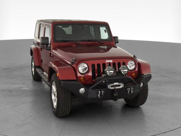 2013 Jeep Wrangler Unlimited Sahara Sport Utility 4D suv Red -... for sale in Alexandria, MD – photo 16