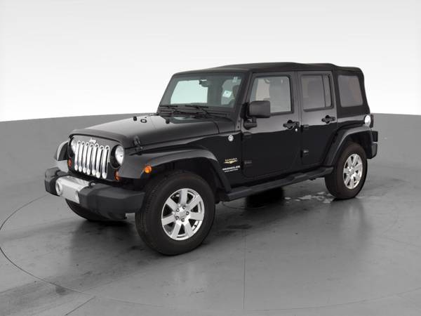 2013 Jeep Wrangler Unlimited Sahara Sport Utility 4D suv Black - -... for sale in Colorado Springs, CO – photo 3