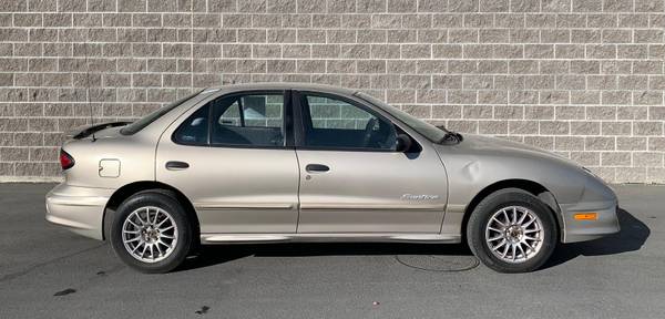 2001 Pontiac Sunfire SE sedan Ultra Silver Metallic for sale in Jerome, ID – photo 2