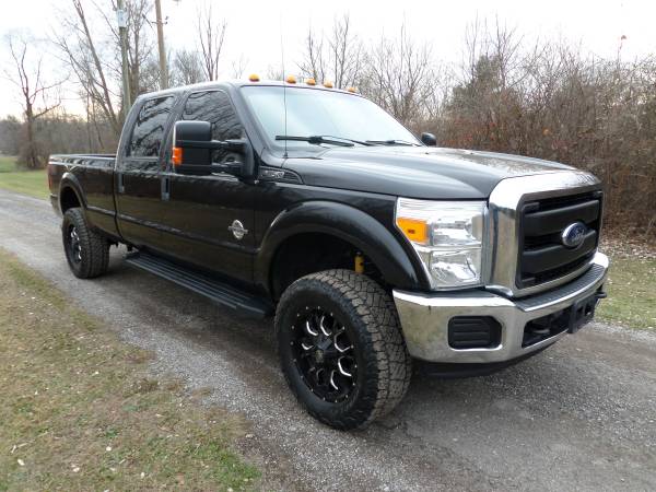 LIFTED POWERSTROKE 2015 FORD F350 CREW CAB 4X4 - cars & trucks - by... for sale in Petersburg, MI – photo 3