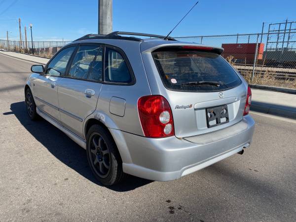 2003 Mazda Protege5 (5-speed manual) - cars & trucks - by owner -... for sale in Denver , CO – photo 4