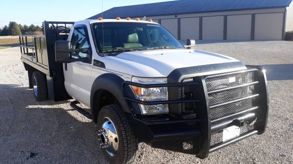2012 Ford F550 4x4 12ft Flatbed 114k 3yr Engine Warranty F-550 -... for sale in Havelock, IA – photo 2