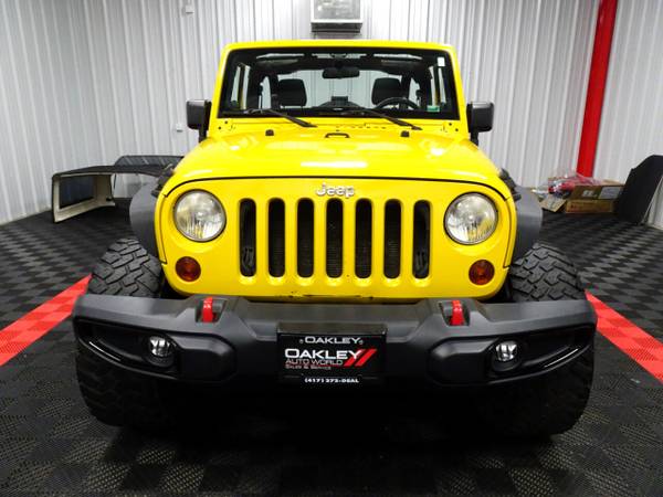 2011 Jeep Wrangler 4WD 2dr Sport hatchback Yellow - cars & trucks -... for sale in Branson West, AR – photo 6