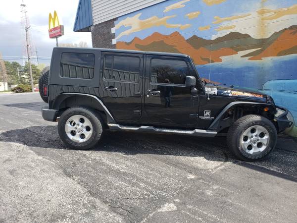 2010 Jeep Wrangler Unlimited Mountain Edition - - by for sale in Saint Joseph, MO – photo 6