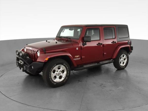 2013 Jeep Wrangler Unlimited Sahara Sport Utility 4D suv Red -... for sale in Alexandria, MD – photo 3
