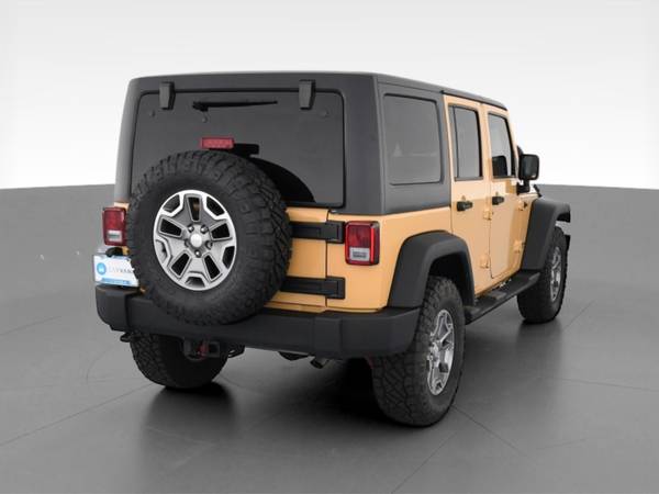2014 Jeep Wrangler Unlimited Rubicon Sport Utility 4D suv Beige - -... for sale in Boulder, CO – photo 10