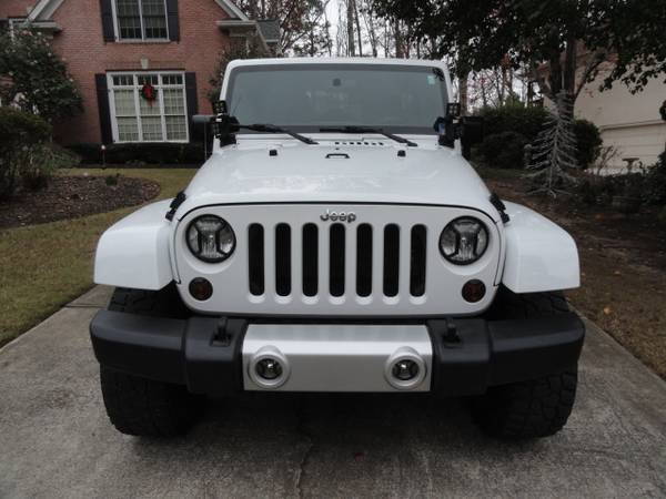 2012 Jeep Wrangler Sahara Unlimited - cars & trucks - by owner -... for sale in Lawrenceville, GA – photo 2