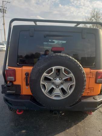 2013 JEEP WRANGLER UNLIMITED SAHARA NEW TIRES LOADED ORANGE - cars & for sale in Kewanee, IL – photo 4