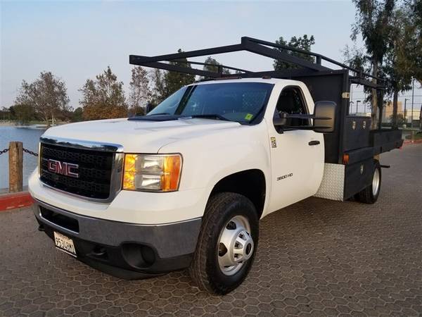 2013 GMC 3500 flat bed with heavy duty ladder rack,12 foot bed , -... for sale in Santa Ana, CA – photo 2