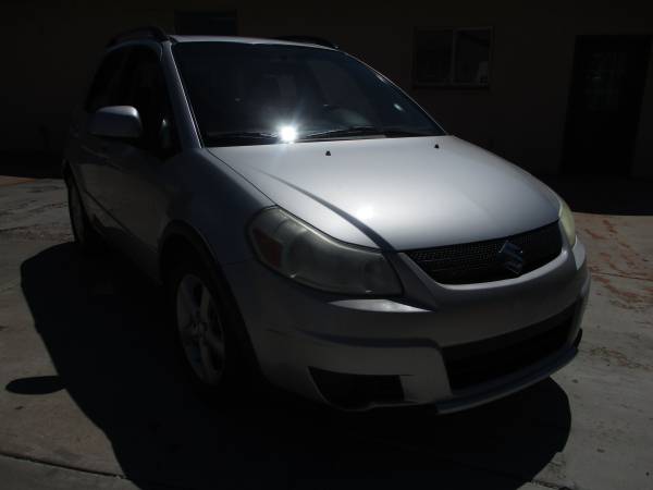 2009 suzuki sx4, awd, manual only 105k miles - cars & trucks - by... for sale in Saint George, UT – photo 4