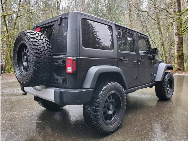 2013 Jeep Wrangler Unlimited Rubicon 6-Spd Manual Lifted - cars & for sale in Bremerton, WA – photo 5