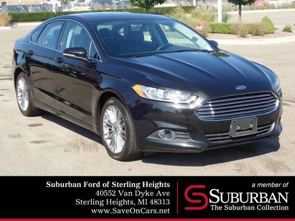 2014 Ford Fusion sedan SE (Tuxedo Black Metallic) GUARANTEED APPROVAL for sale in Sterling Heights, MI – photo 2