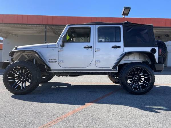 2010 Jeep Wrangler Unlimited Sport suv Bright Silver Metallic - cars for sale in Salinas, CA – photo 2