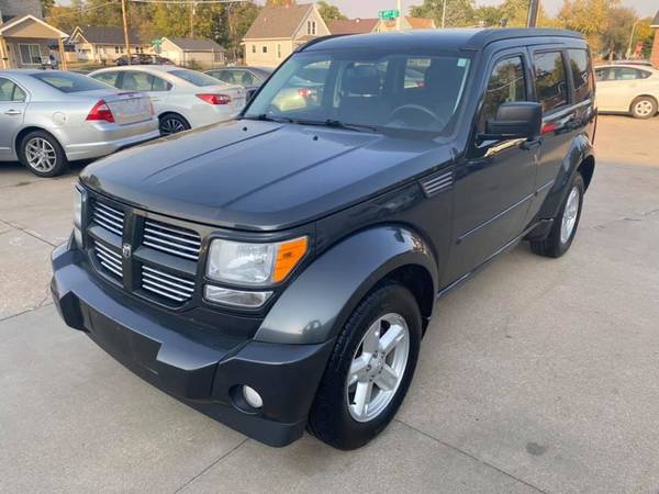 2011 Dodge Nitro SXT 4x4 - cars & trucks - by dealer - vehicle... for sale in Lincoln, MO – photo 4