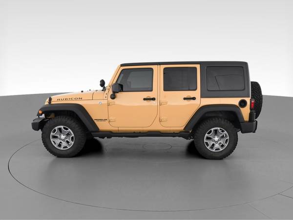2014 Jeep Wrangler Unlimited Rubicon Sport Utility 4D suv Beige - -... for sale in Raleigh, NC – photo 5