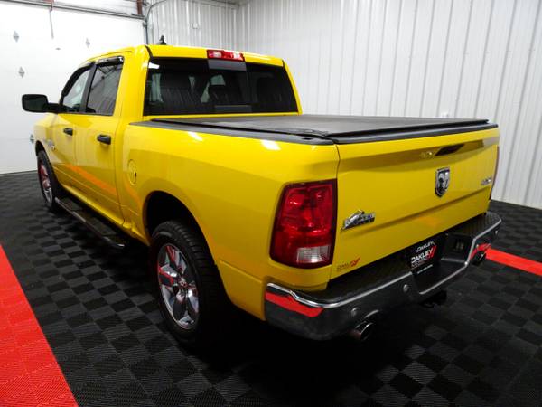 2016 RAM 1500 4WD Crew Cab 140.5" Big Horn pickup Yellow - cars &... for sale in Branson West, AR – photo 9