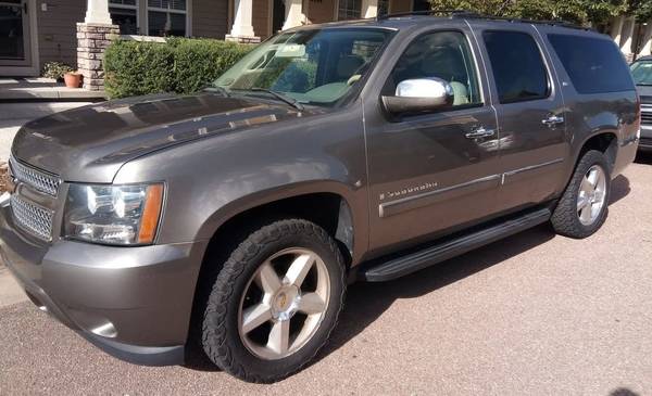 Suburban with 18K miles on new Engine - cars & trucks - by owner -... for sale in Colorado Springs, CO – photo 5