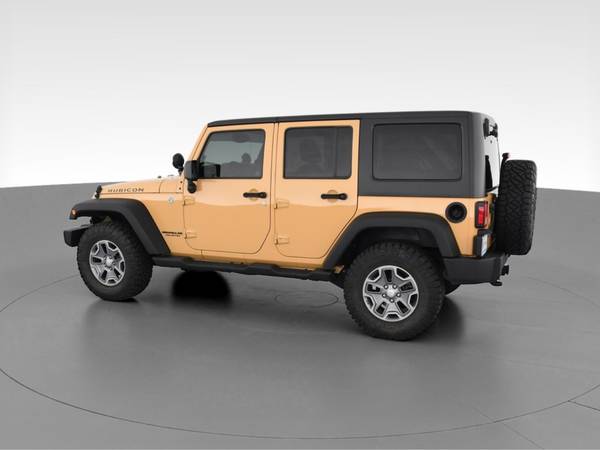 2014 Jeep Wrangler Unlimited Rubicon Sport Utility 4D suv Beige - -... for sale in Jacksonville, NC – photo 6