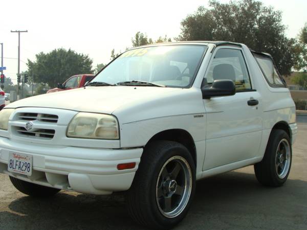 1999 SUZUKI VITARA JS CONVERTIBLE 4 CYLINDERS AUTOMATIC LOW MILES -... for sale in Tulare, CA – photo 2