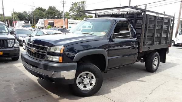 2006 chevy flatbed stake bed rack body with liftgate for sale in Elmont, NY