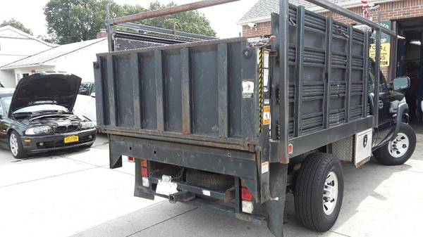 2006 chevy flatbed stake bed rack body with liftgate for sale in Elmont, NY – photo 6