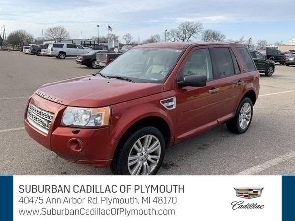 2009 Land Rover LR2 SUV HSE - Land Rover Rimini Red - cars & trucks... for sale in Plymouth, MI – photo 2