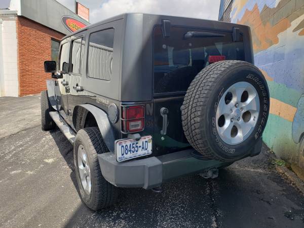 2010 Jeep Wrangler Unlimited Mountain Edition - - by for sale in Saint Joseph, MO – photo 3