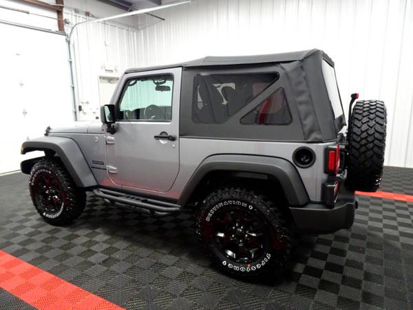 2013 Jeep Wrangler 4WD Sport hatchback Silver - cars & trucks - by... for sale in Branson West, AR – photo 2
