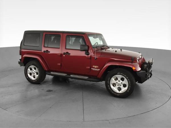 2013 Jeep Wrangler Unlimited Sahara Sport Utility 4D suv Red -... for sale in Alexandria, MD – photo 14