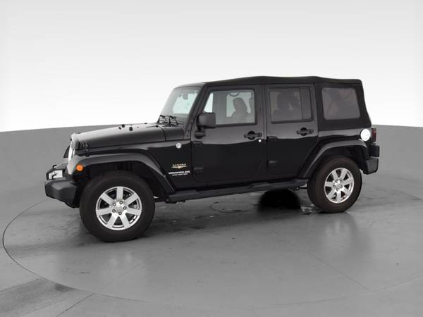 2013 Jeep Wrangler Unlimited Sahara Sport Utility 4D suv Black - -... for sale in Colorado Springs, CO – photo 4