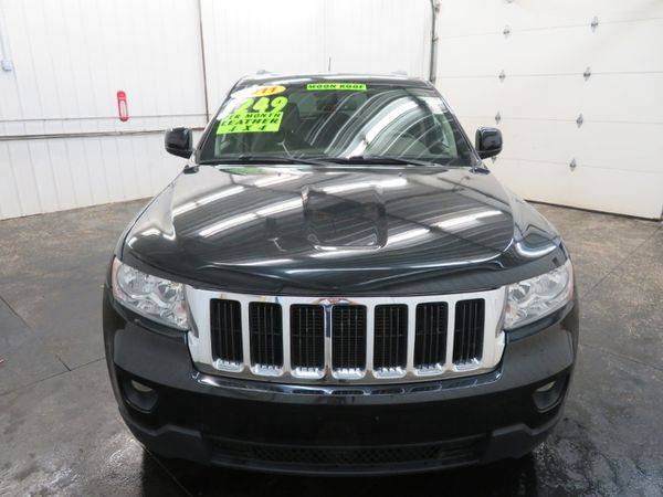2011 Jeep Grand Cherokee 4WD 4dr Laredo - LOTS OF SUVS AND TRUCKS!! for sale in Marne, MI – photo 2