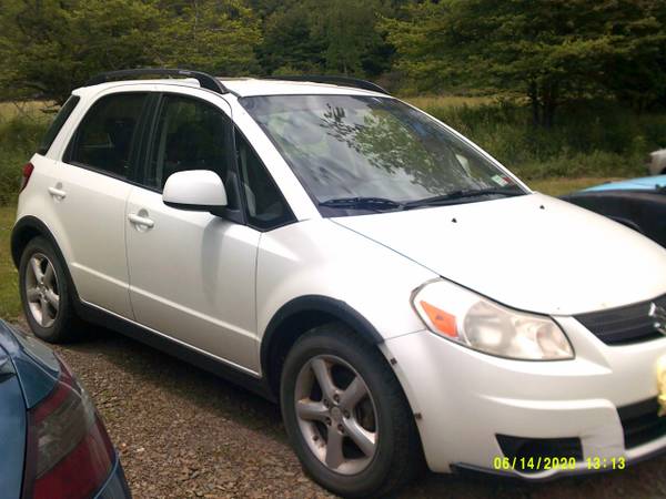2007 White Suzuki SX4 - cars & trucks - by owner - vehicle... for sale in Candor, NY – photo 2