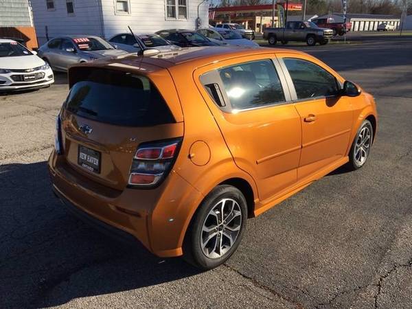 2018 Chevy Chevrolet Sonic LT hatchback Orange - cars & trucks - by... for sale in Mansfield, OH – photo 3