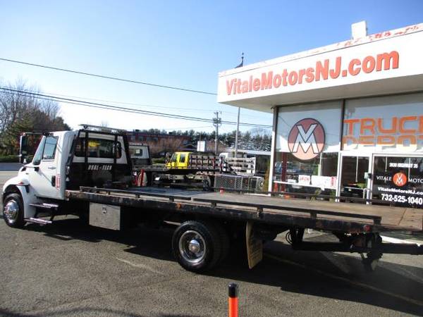 2012 International 4300 ROLL BACK, FLAT BED, TOW TRUCK ** 66K MILES... for sale in south amboy, WV – photo 2