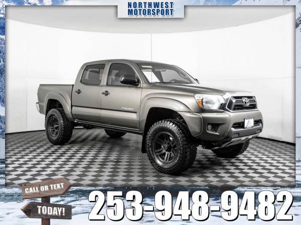 Lifted 2015 *Toyota Tacoma* SR5 4x4 - cars & trucks - by dealer -... for sale in PUYALLUP, WA