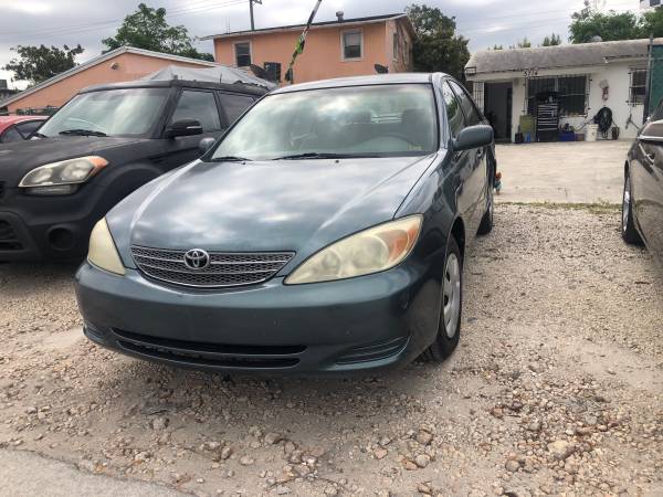 2003 Toyota Camry four-door sedan - - by dealer for sale in Hollywood, FL